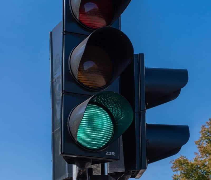a traffic light with a green light on it