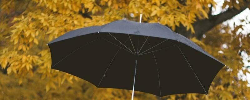 floating black umbrella